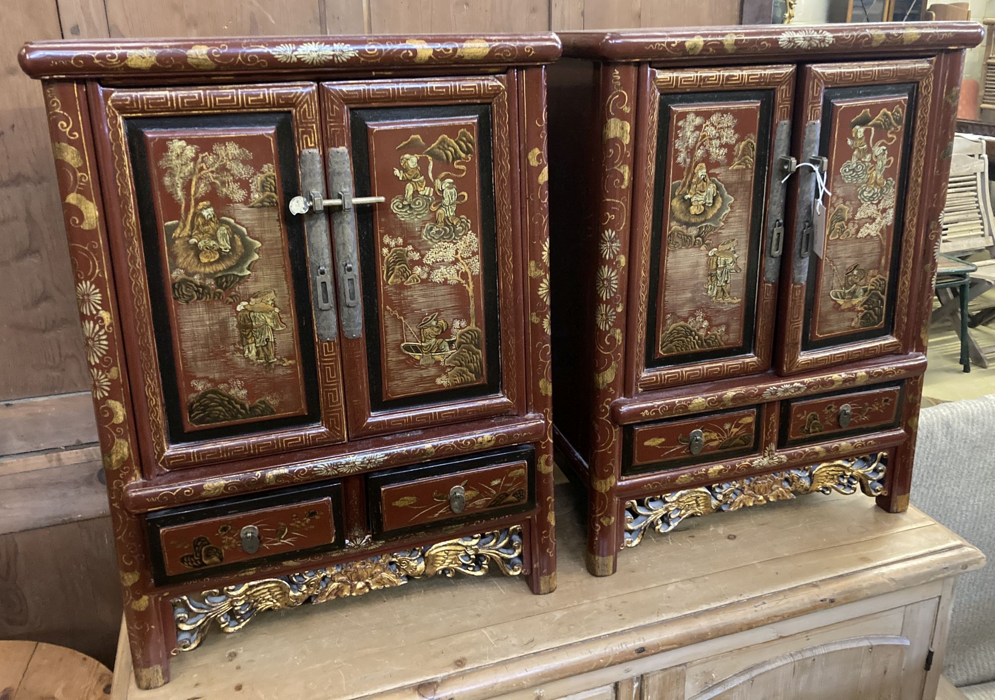 A pair of Chinese scarlet lacquer cabinets, width 54cm, depth 32cm, height 73cm